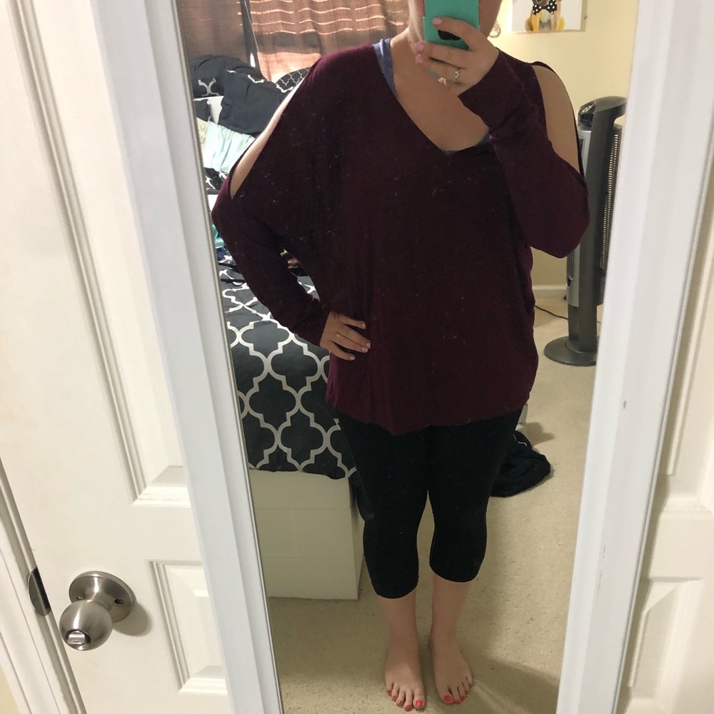 Long sleeve piko style top with slits in arms